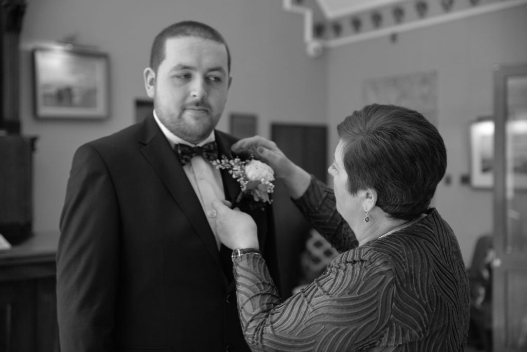 Groom and Mother getting ready for the wedding ceremony