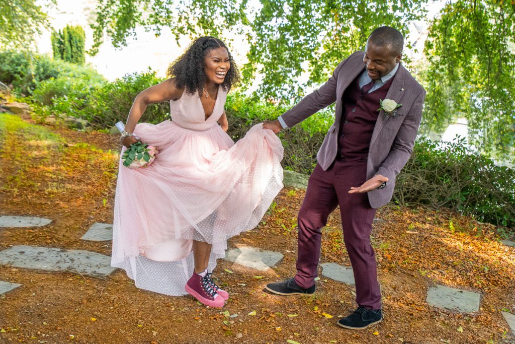Bride and Groom laughing during wedding photography in the Raheen Woods Hotel Galway