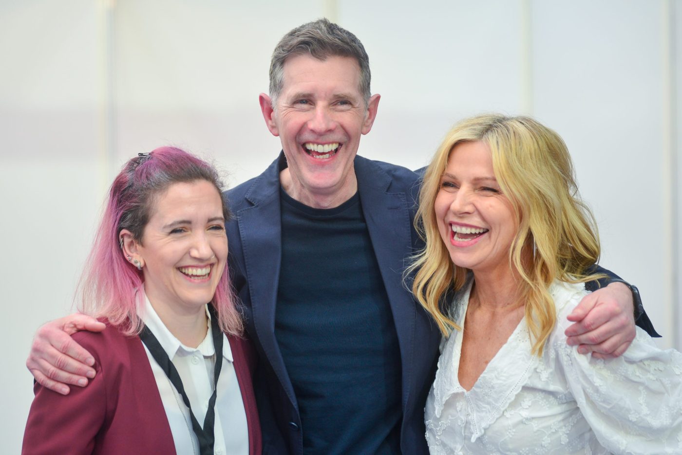 Guests smiling together at an event