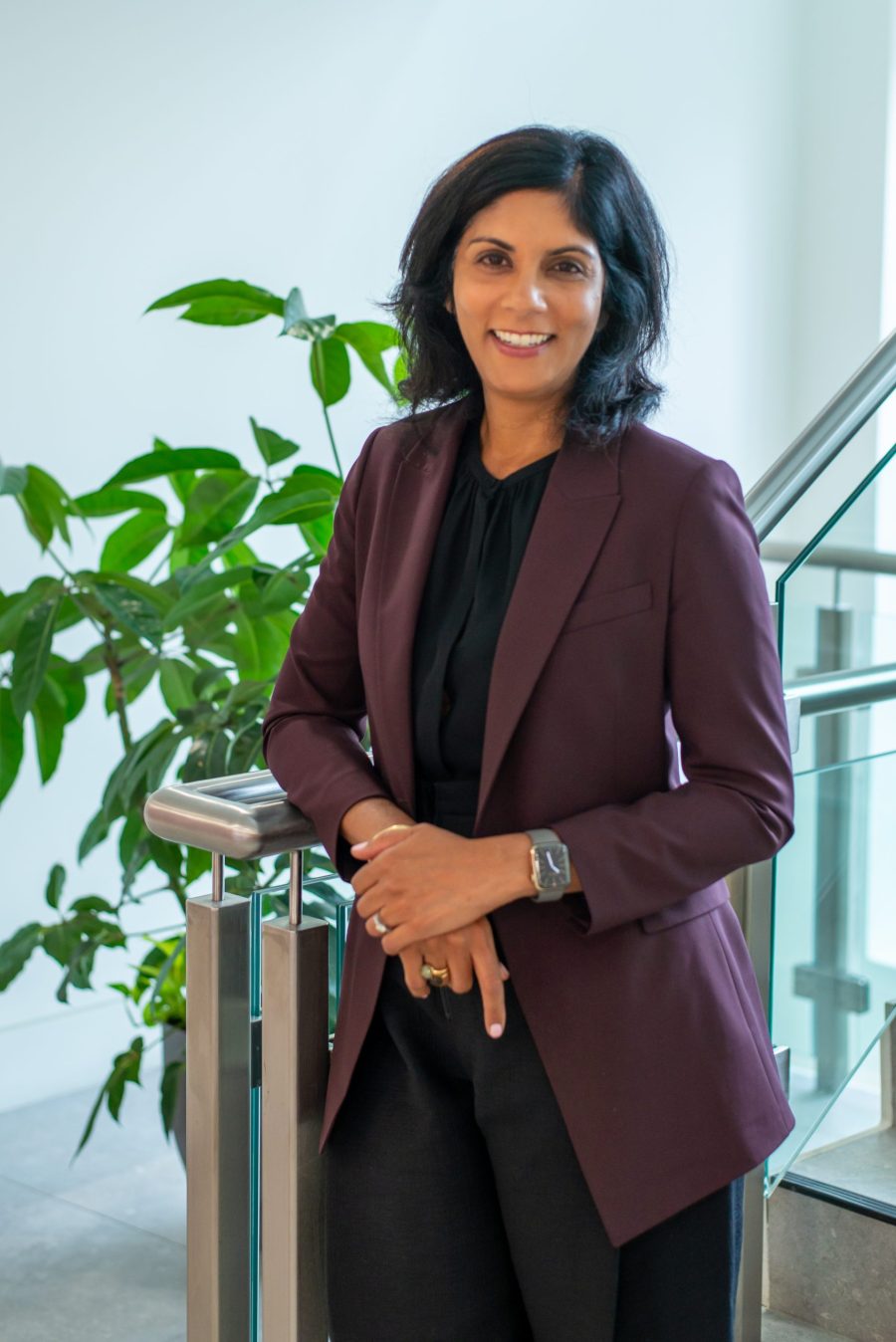 Professional portrait taken in an office setting