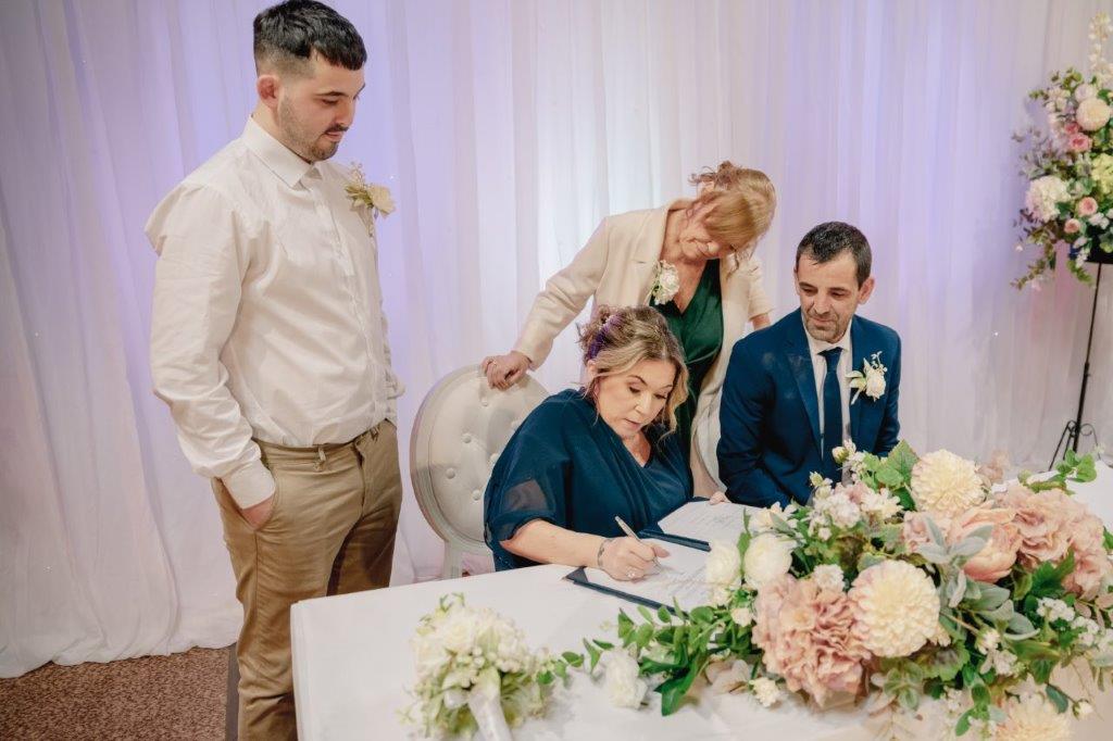 Signing the green book marriage license