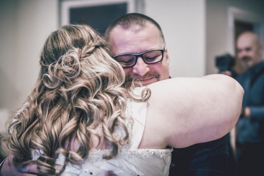 Father giving daughter away at marriage