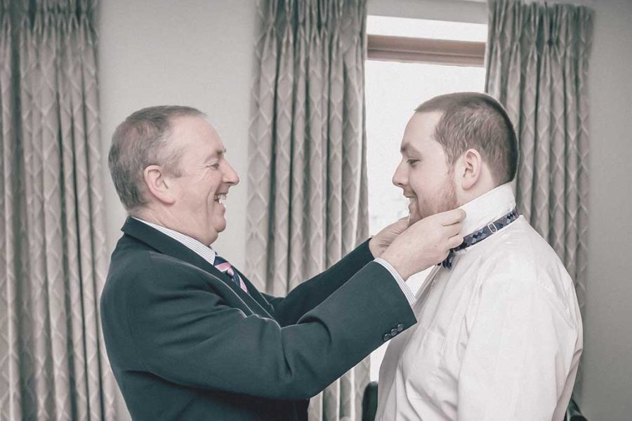 wedding photography groom getting ready